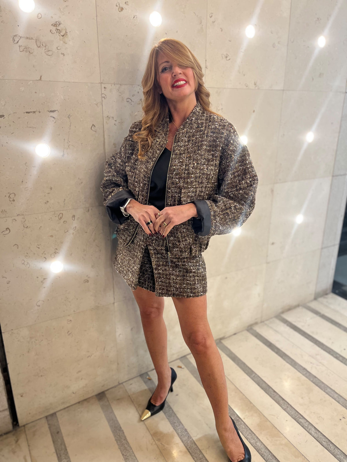 Minigonna in tweed con cintura imperial