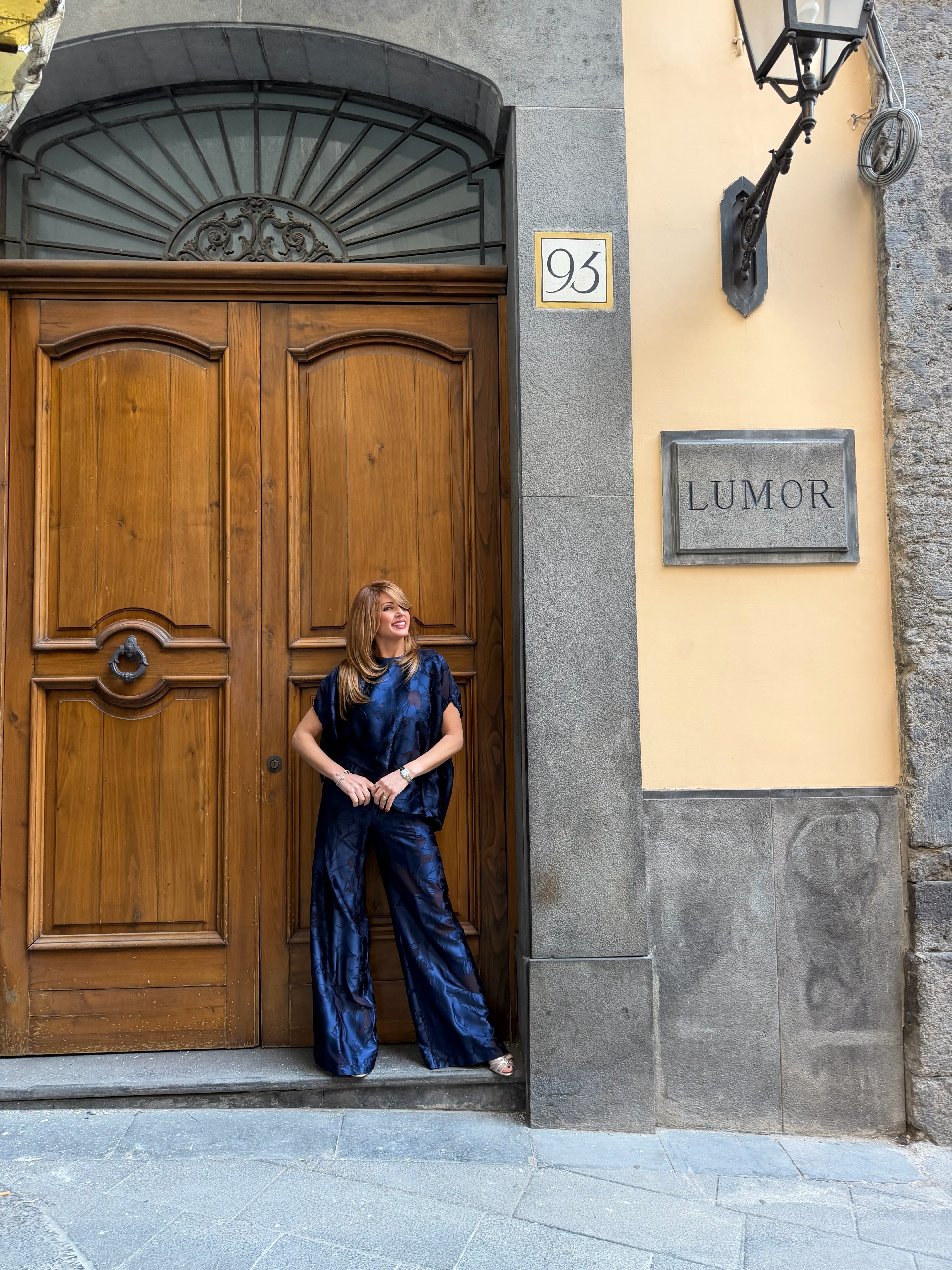 Blusa in raso floreale Icona