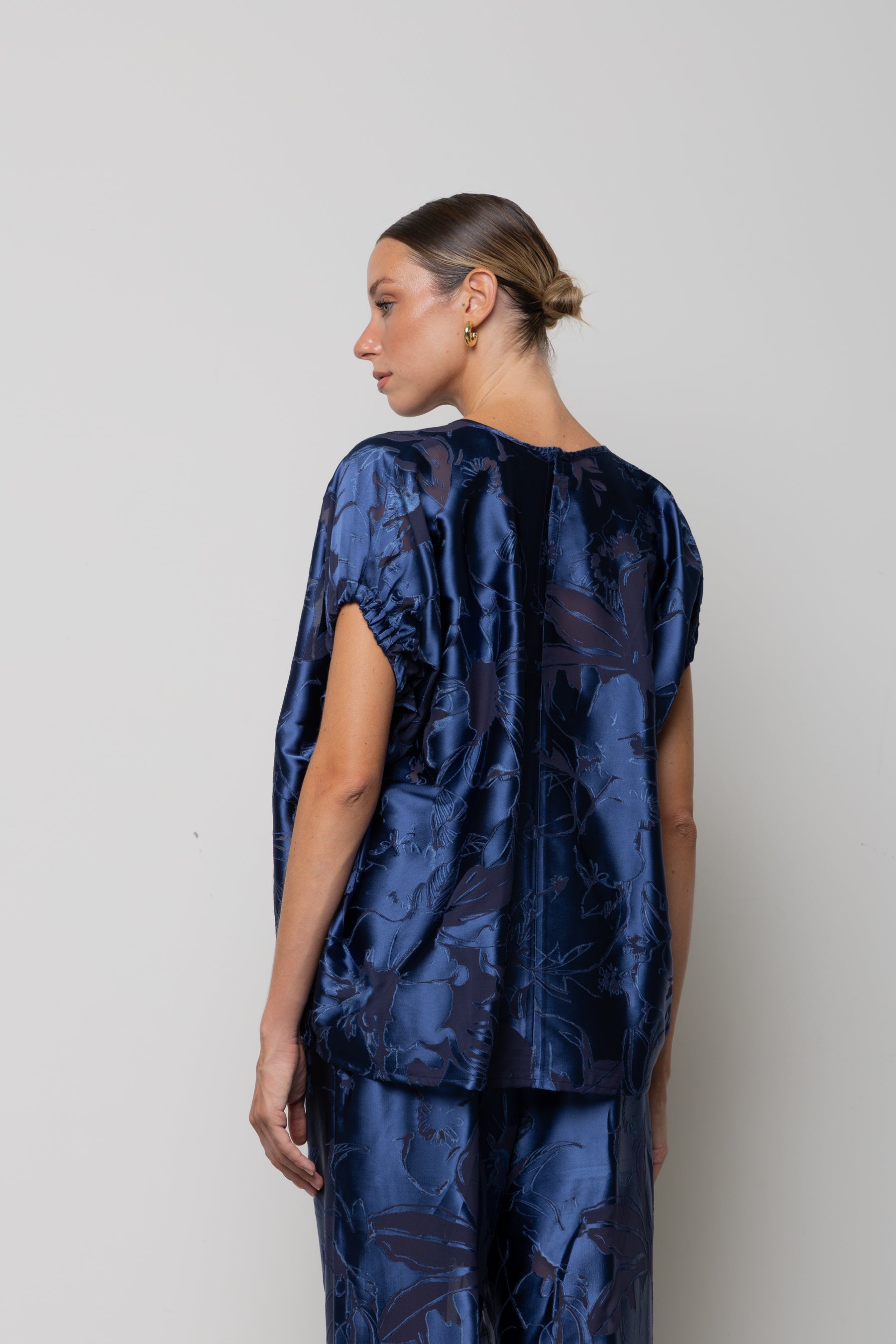 Blusa in raso floreale Icona
