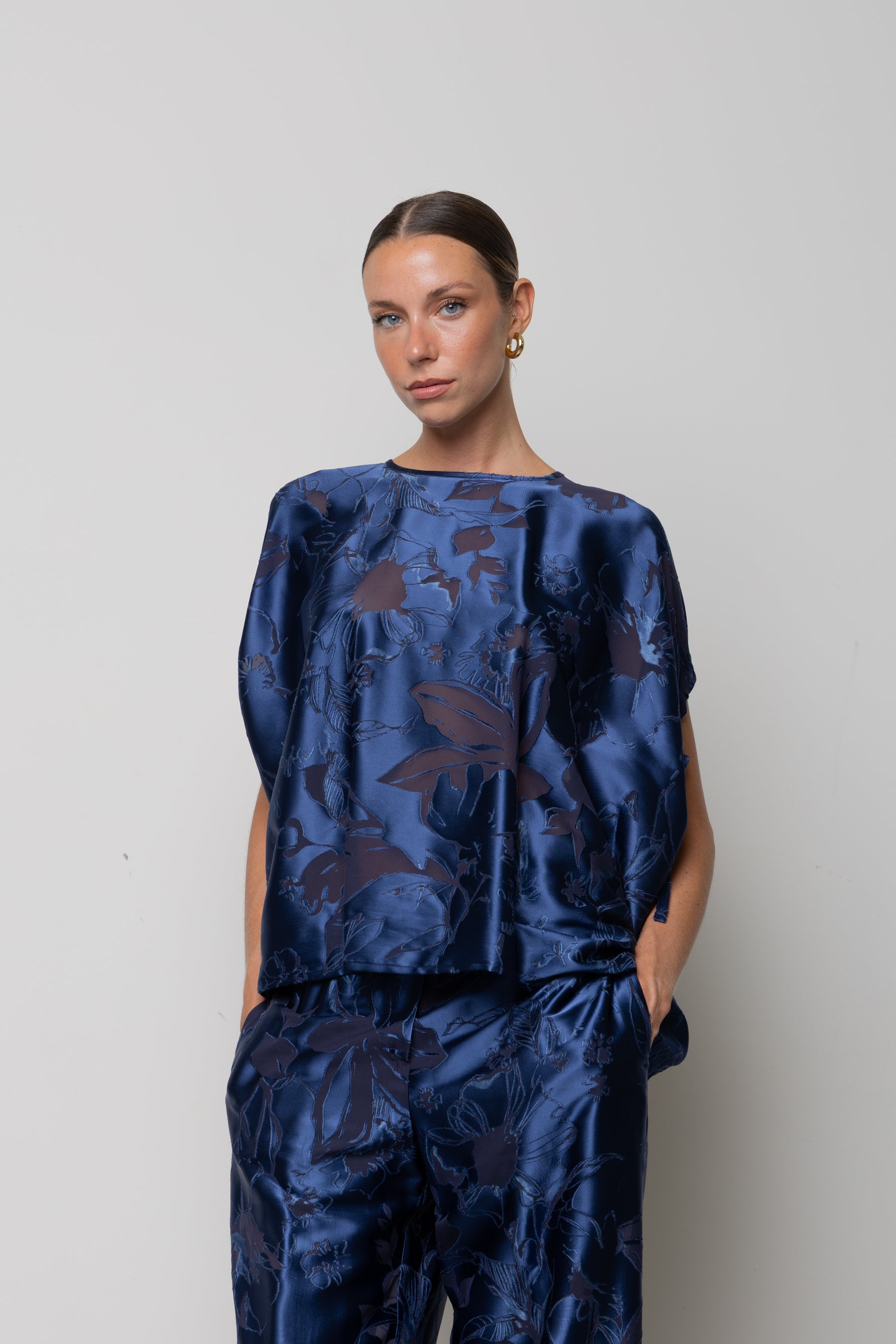 Blusa in raso floreale Icona