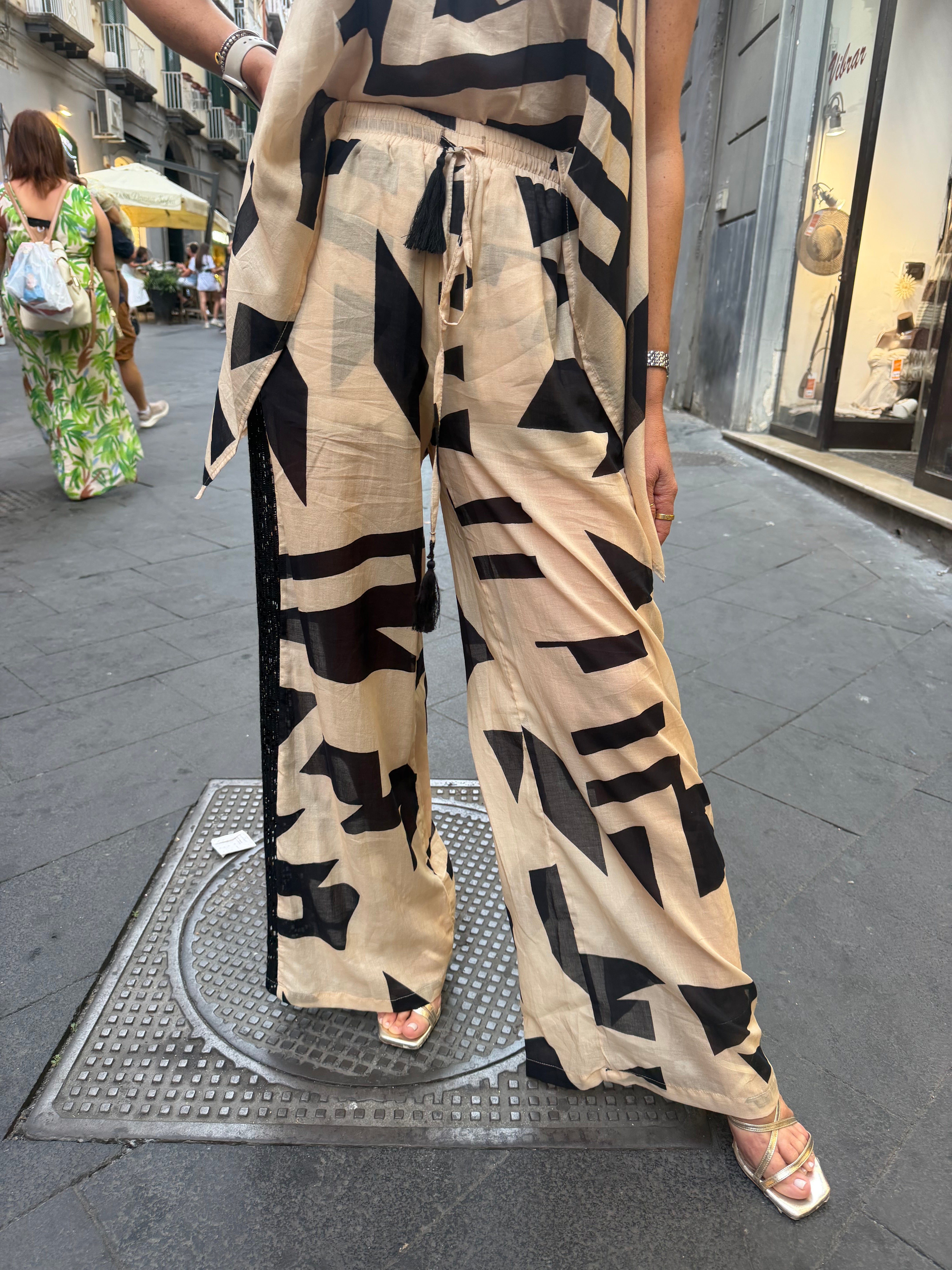 Pantalone in mussola di cotone stampa astratta con dettaglio in pizzo Angela Davis