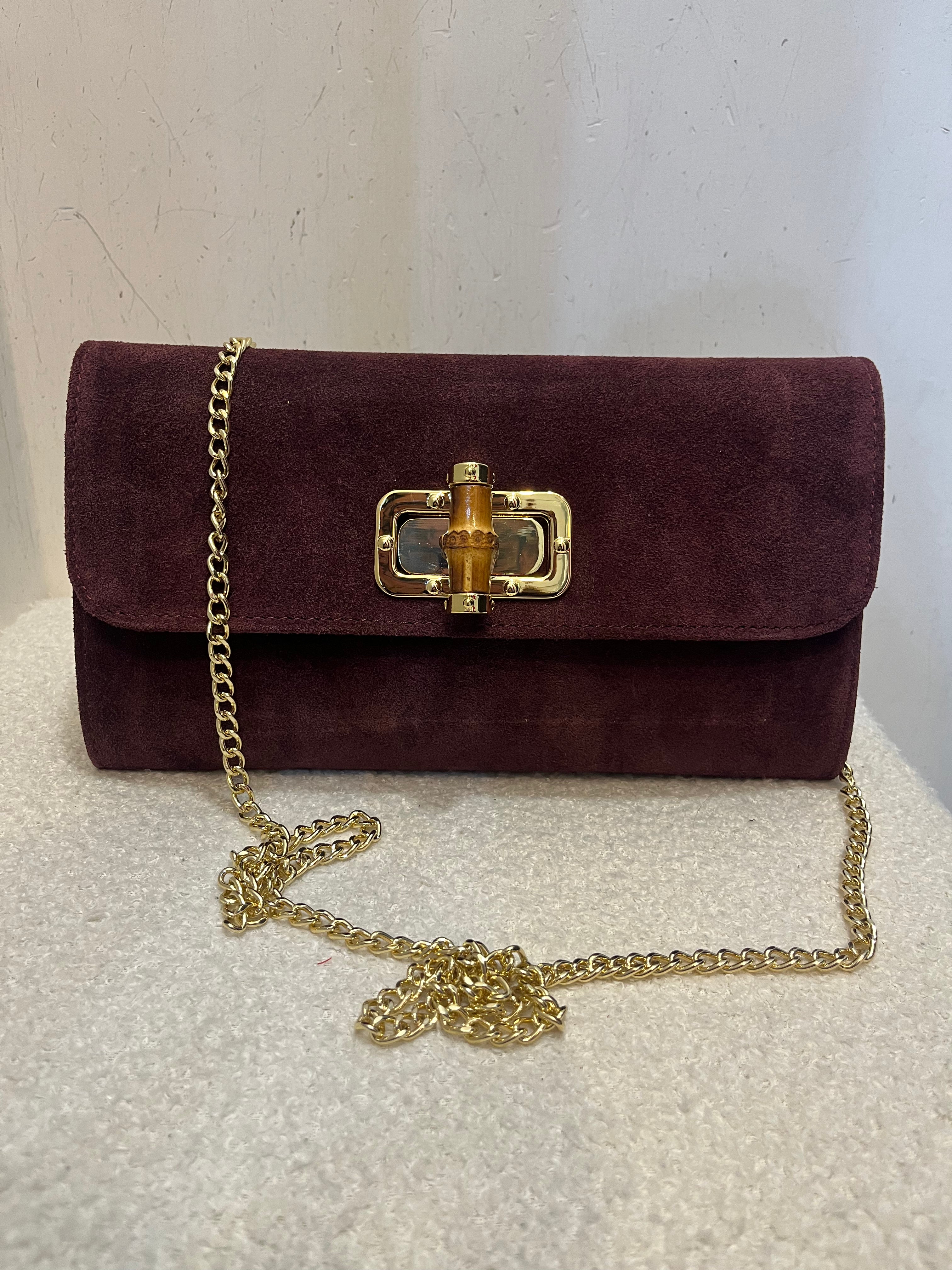 Pochette in camoscio con catena lunga oro