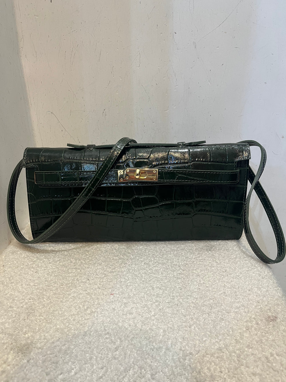 Pochette coccodrillo bustina con tracolla in pelle