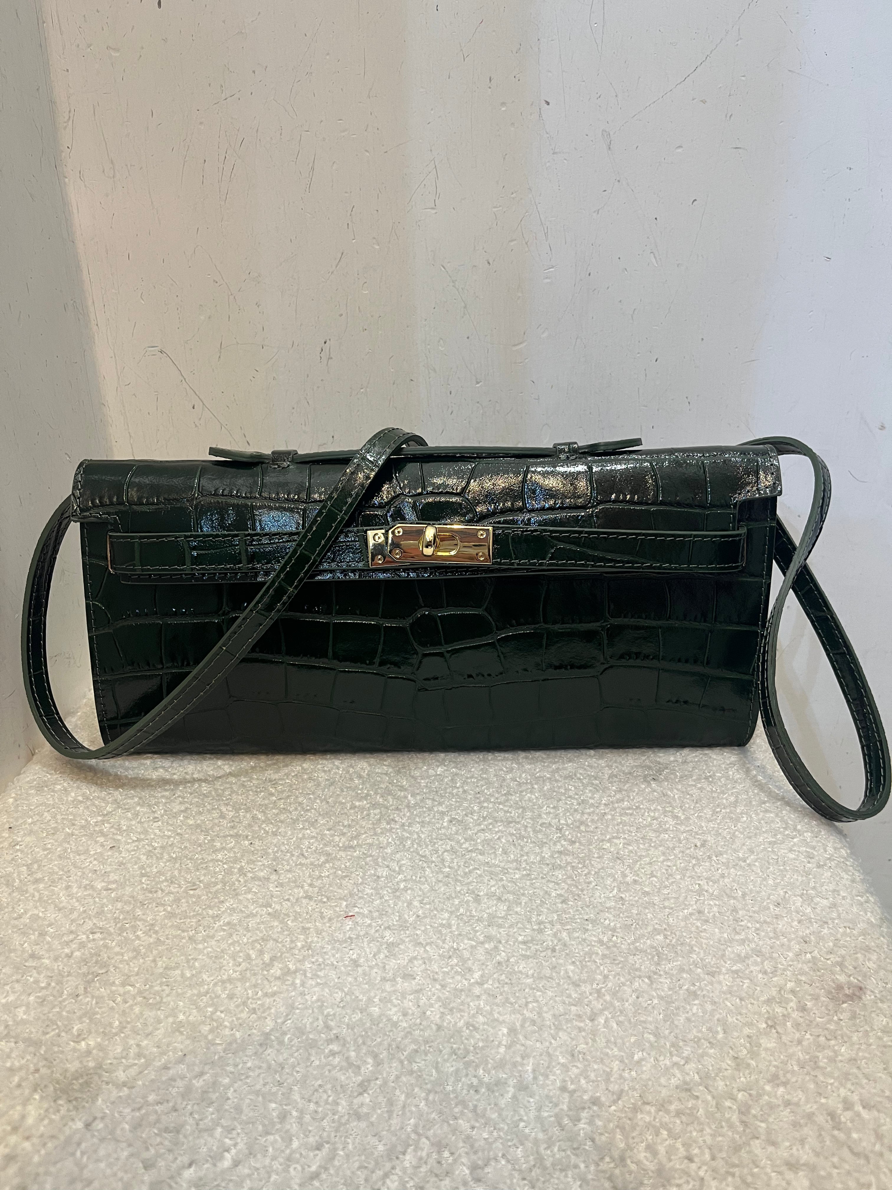 Pochette coccodrillo bustina con tracolla in pelle
