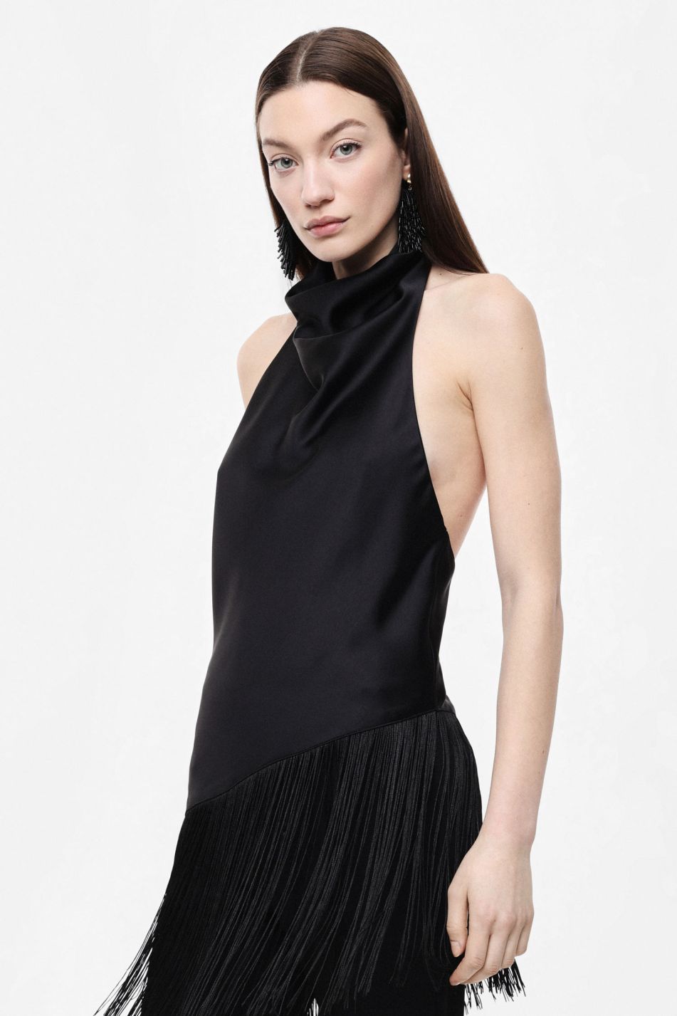 Top asimmetrico con frange e scollo halter Imperial