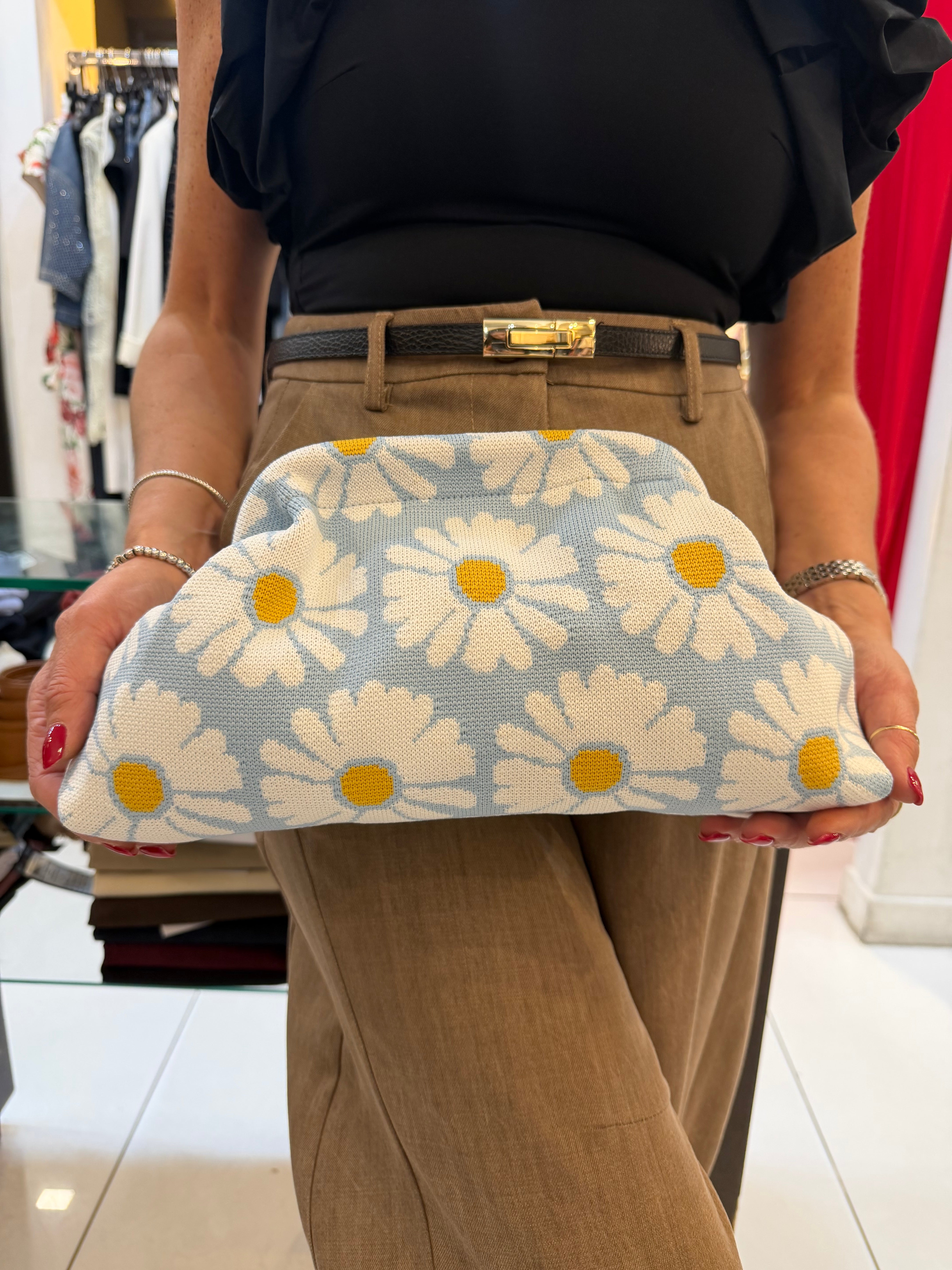 Clutch con margherite in tessuto Emisphere